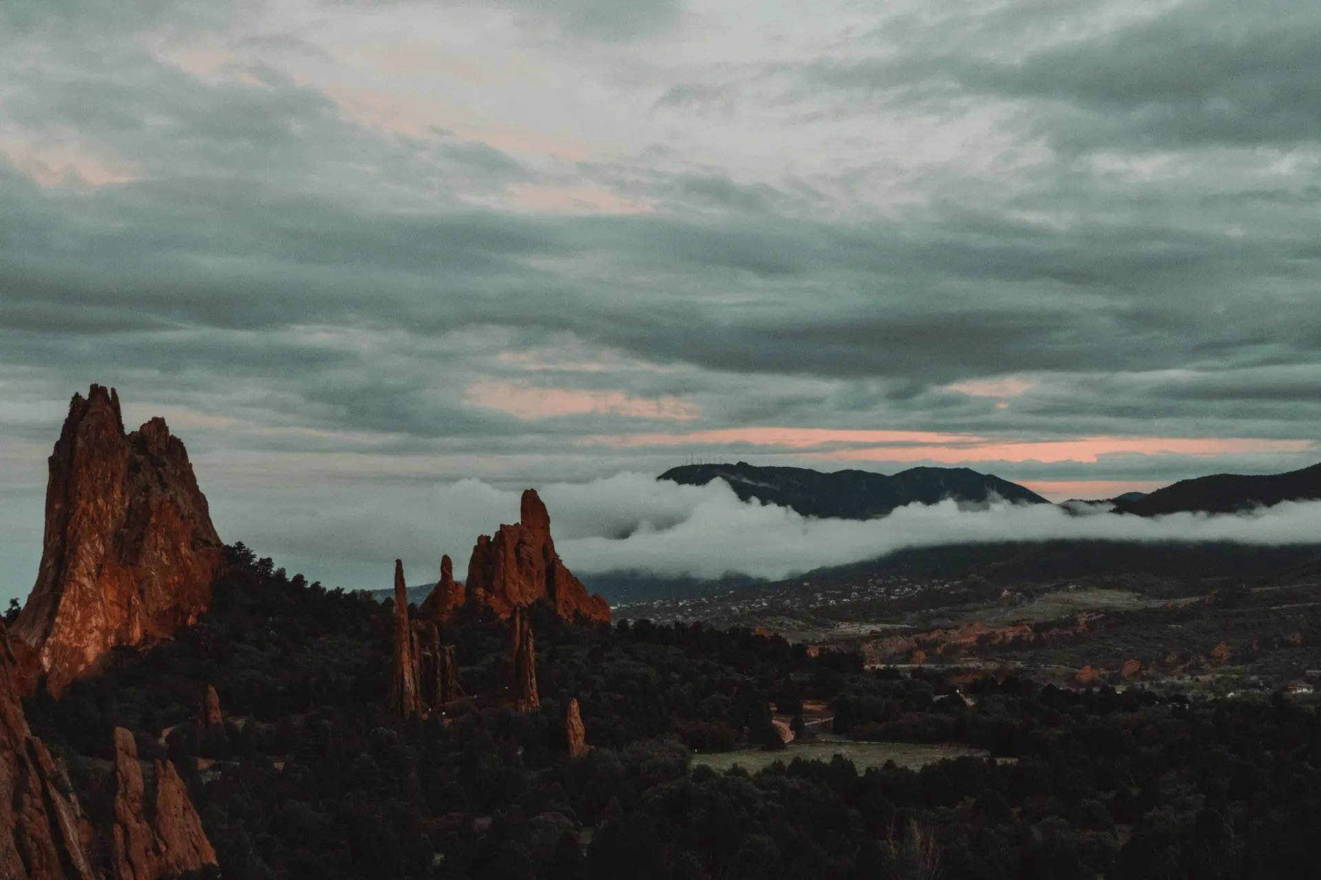 View the Gods with dramatic clouds and rock formations in Colorado Springs