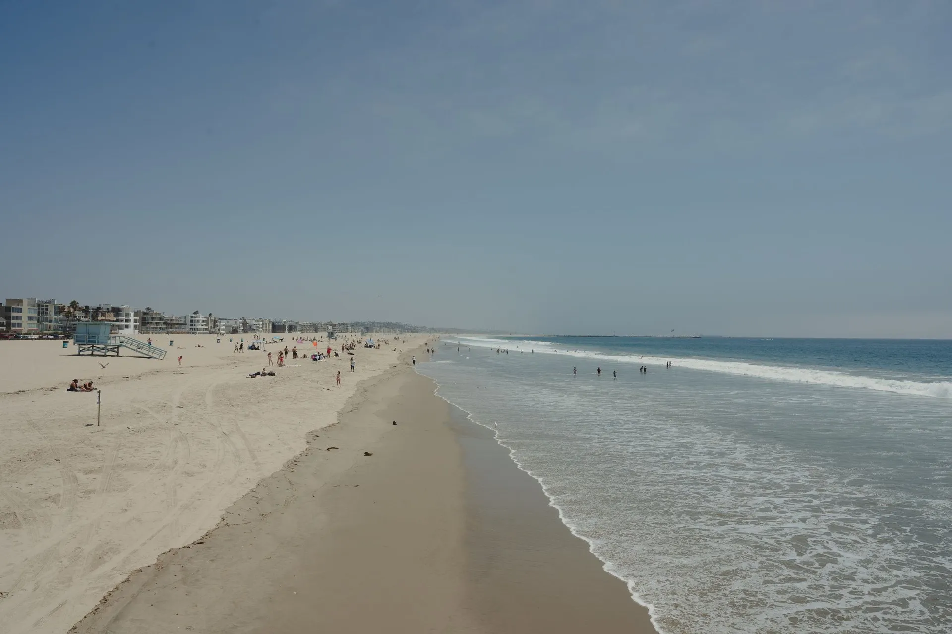 A panoramic view of a bustling day at Venice Beach, Los Angeles