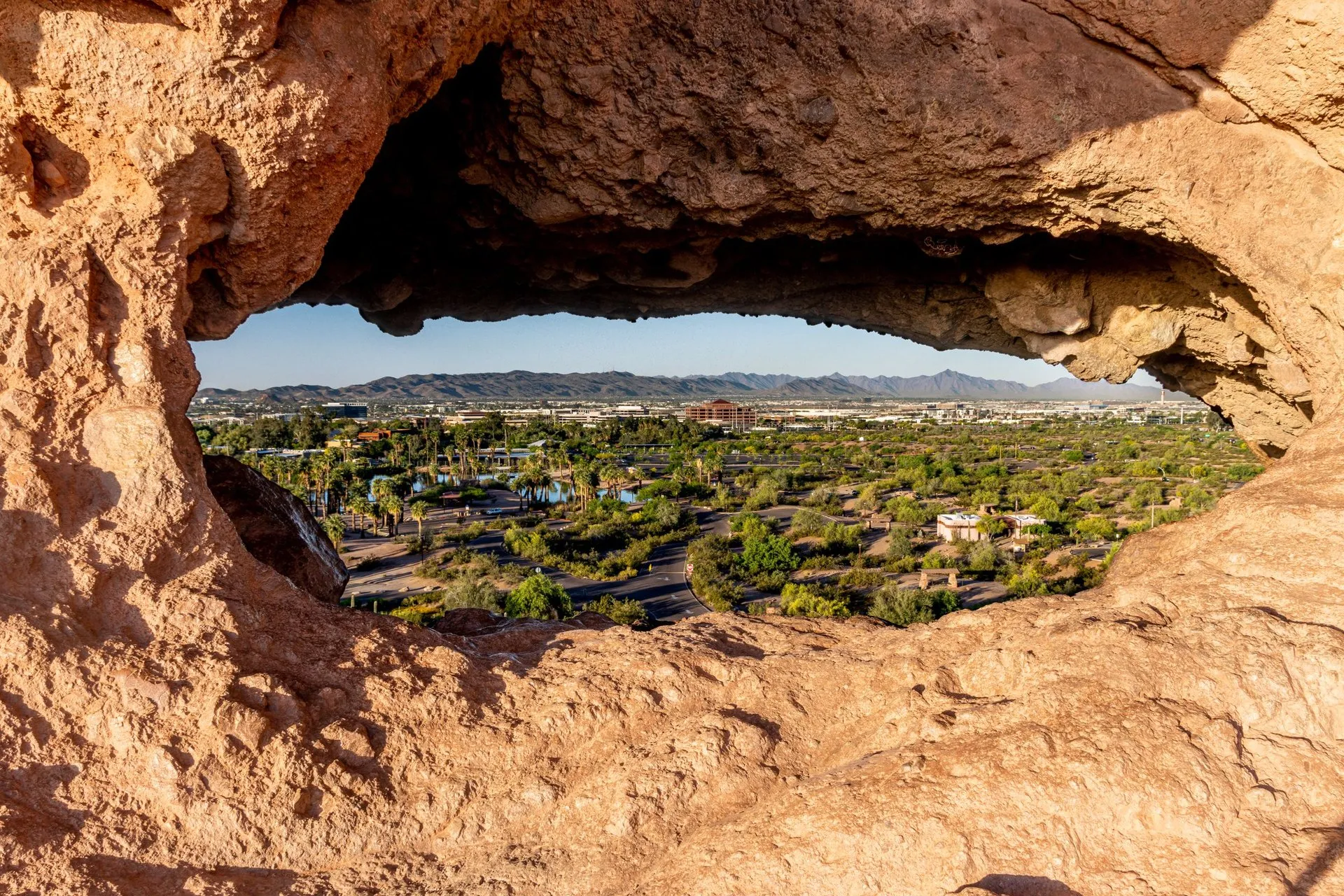 Capture of Phoenix cityscape through a unique rock formation